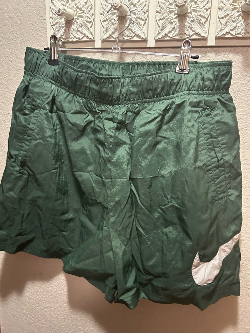 Nike Green Athletic Shorts with White Swoosh